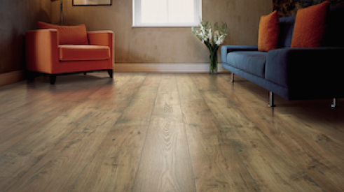 The Mohawk Rare Vintage collection of laminate flooring features heavily textured planks with the appearance of reclaimed hardwood.