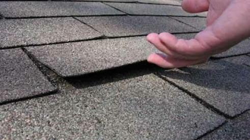 Loose shingles indicate use of short roofing nails, inspector says